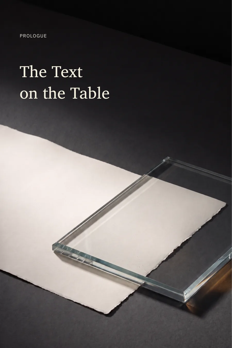 Glass and paper. The Text on the Table